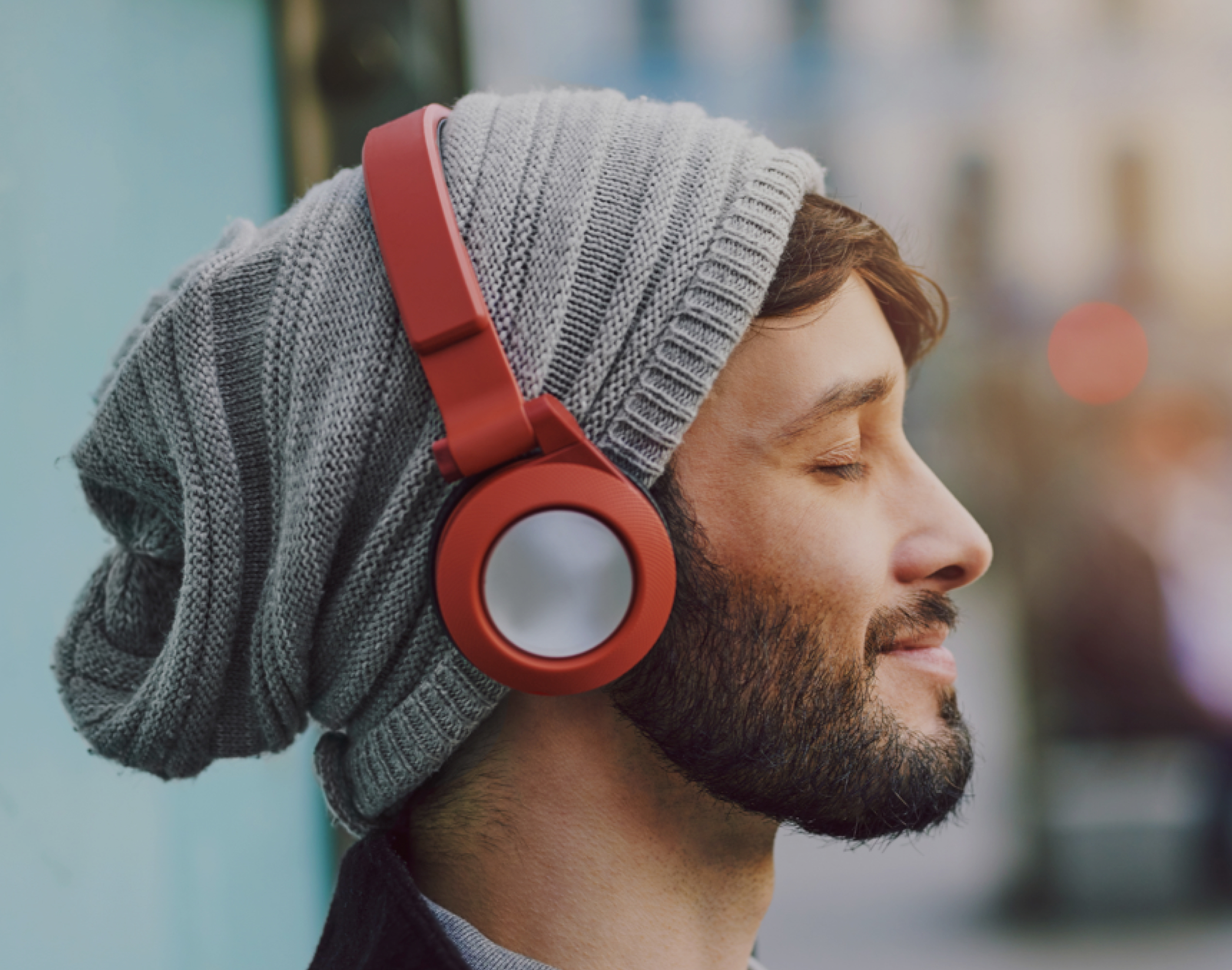 Qualcomm project image with a listener wearing headphones